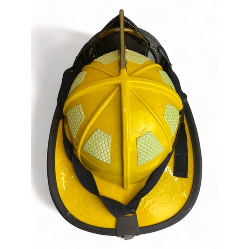 185 - A NEW CAIRNES 1010 AMERICAN FIREFIGHTERS HELMET, FOR ANDOVER FIRESTATION