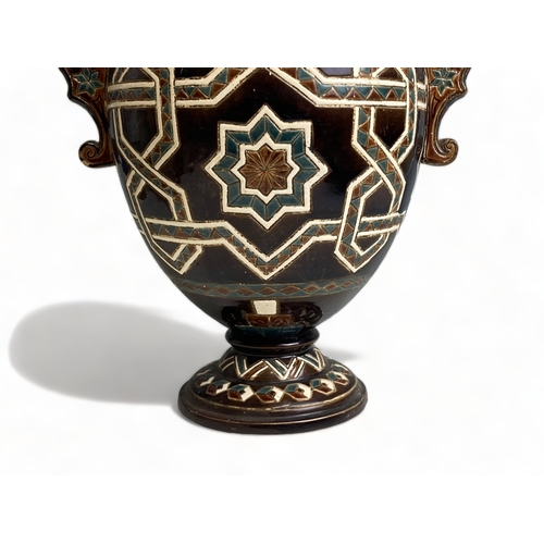 213 - A GERBING & STEPHAN MAJOLICA TWIN HANDLE VASE. STYLISED PATTERNS & UNUSUAL BULBOUS NECK. CIRCA 1890.... 