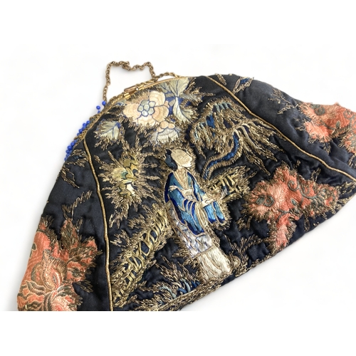 276 - Antique Chinese embroidered ladies purse.
23 x 15cm