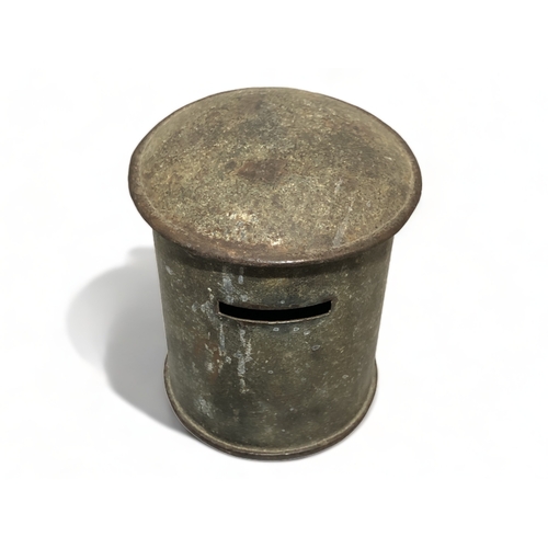 304 - AN ANTIQUE LARGE METAL MONEY BOX