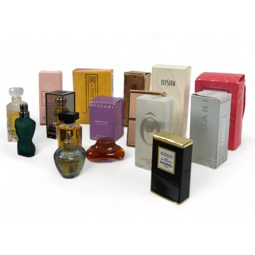 327 - A large collection of miniature ladies perfumes. Including Bvalgari, Chanel, Lancome & more.