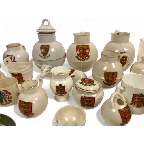 340 - A large collection of Crested wares, including Goss.