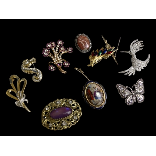 344 - Collection of 10 large paste and crystal set costume jewellery brooches, largest 7.5cm.