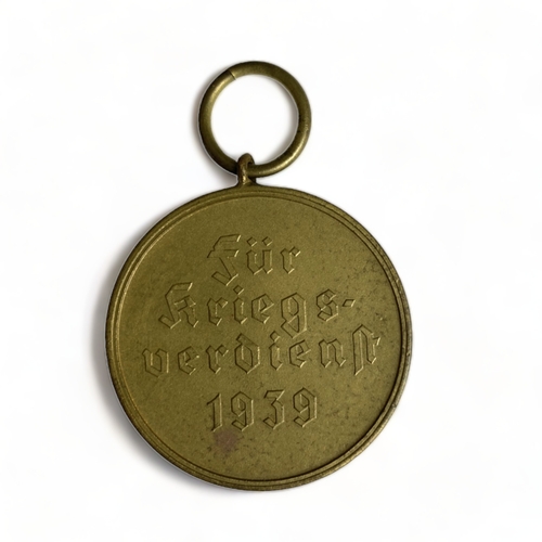 349 - 1939 German 'For War Merit' medal, 'Für Kriegsverdienst', complete with unused ribbon and paper slee... 