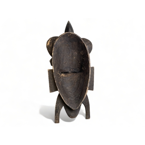 355 - West African carved Kpelie mask, probably Senufo. 
Height - 39cm