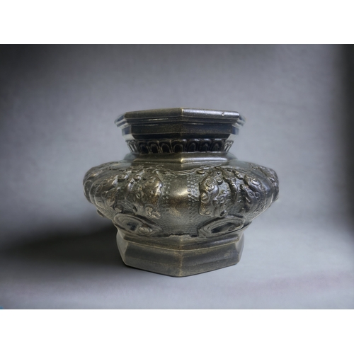 84 - A CHINESE QING DYNASTY BRONZE OCTAGONAL CENSER. 
10 X 14CM