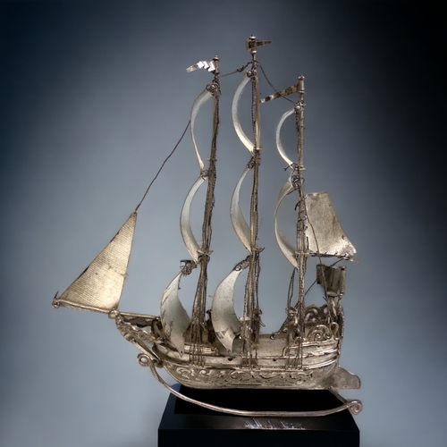 779 - A DUTCH SILVER MINIATURE 'NEFF' SAILING BOAT. 
J. VERHOOGT HOORN (1894-1936).
HEIGHT - 20CM
WEIGHT -... 