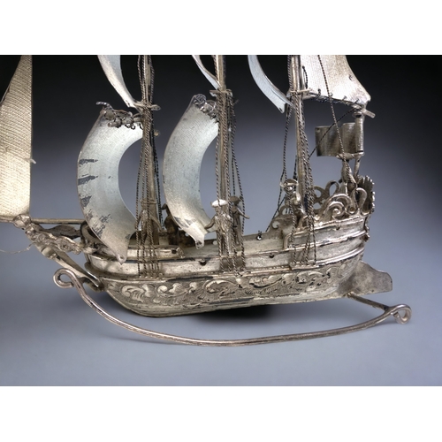 779 - A DUTCH SILVER MINIATURE 'NEFF' SAILING BOAT. 
J. VERHOOGT HOORN (1894-1936).
HEIGHT - 20CM
WEIGHT -... 