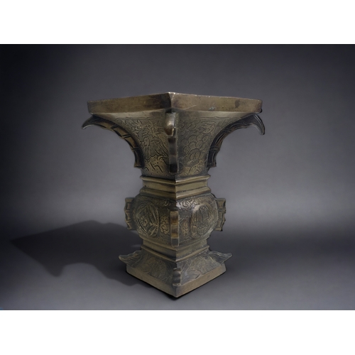 85 - A CHINESE BRONZE CENSER. QING DYNASTY. 
ARCHAISTIC FORM, ENGRAVED WITH DEET, BIRDS & FLOWERS. 
HEIGH... 