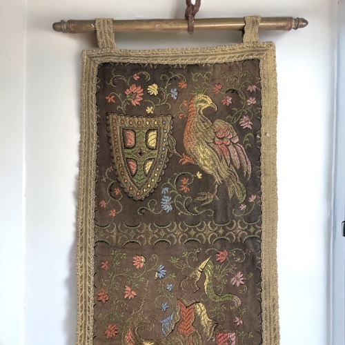 371 - A VICTORIAN UPHOLSTERED WALL HANGING.
LENGTH - 61CM