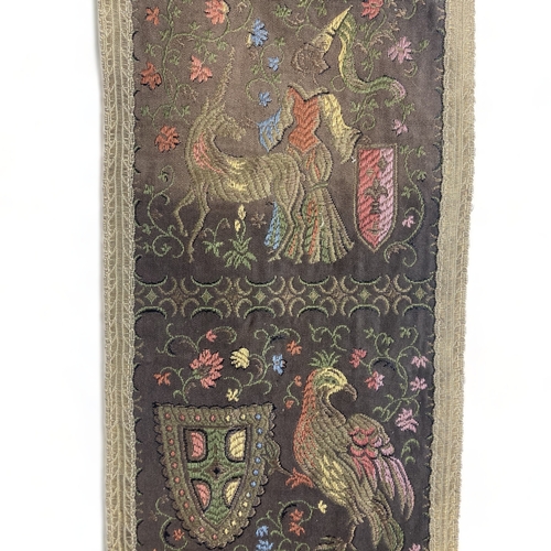 371 - A VICTORIAN UPHOLSTERED WALL HANGING.
LENGTH - 61CM