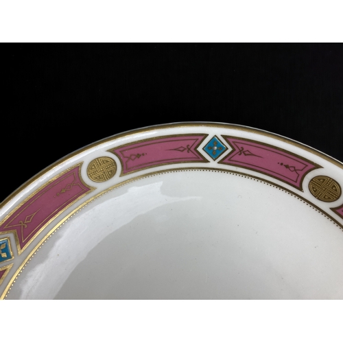 375 - A PAIR OF VICTORIAN MINTON PORCELAIN DISHES. GILT, TURQUOISE & GILDED BORDER PATTERN.
DIAMETER - 23.... 