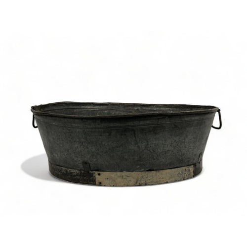 396 - A Large Heavy Galvanised Bath / Planter