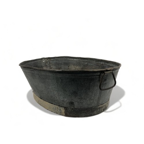 396 - A Large Heavy Galvanised Bath / Planter