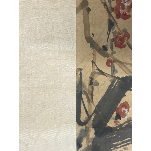 413 - A Chinese wall hanging Scroll.
Finely painted bird amongst bamboo scene.