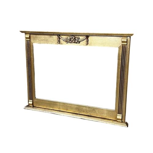 780 - A gilt wood over mantle mirror. 
107 x 65cm