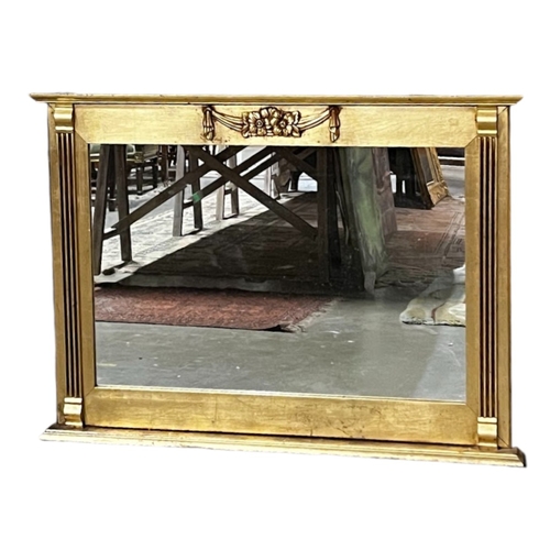 780 - A gilt wood over mantle mirror. 
107 x 65cm