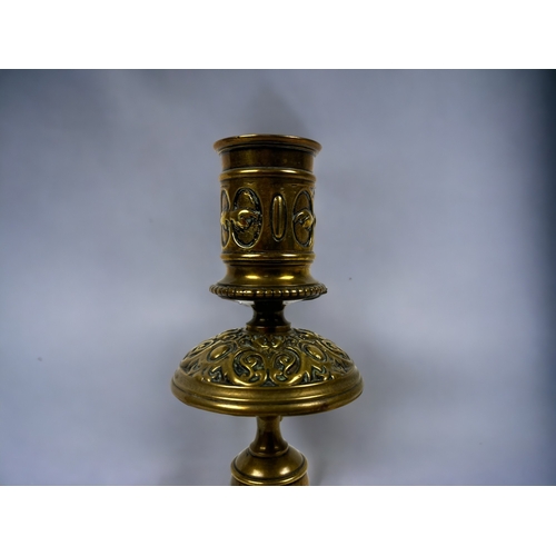 124 - A pair of 19th century Grand tour French bronze candlesticks. Stylised foliate design.