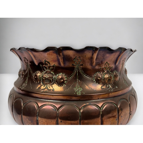 125 - A Victorian William Soutter & sons copper jardinière / planter. Repousse stylised foliate design.