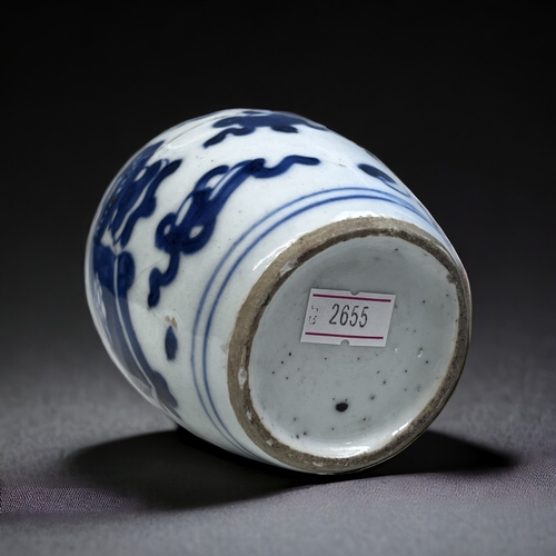 166 - A CHINESE BLUE & WHITE PORCELAIN VASE. 
Qing dynasty. painted with Buddhist auspicious symbols. Toge... 