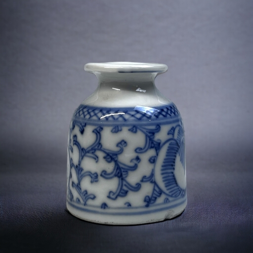 166 - A CHINESE BLUE & WHITE PORCELAIN VASE. 
Qing dynasty. painted with Buddhist auspicious symbols. Toge... 