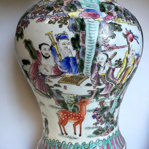 179 - A LARGE CHINESE PORCELAIN VASE.
Yenyen form, elaborately decorated in overglaze enamels scenes.
Six ... 