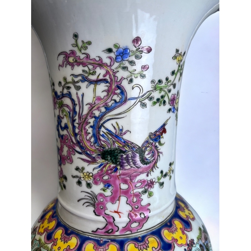 179 - A LARGE CHINESE PORCELAIN VASE.
Yenyen form, elaborately decorated in overglaze enamels scenes.
Six ... 