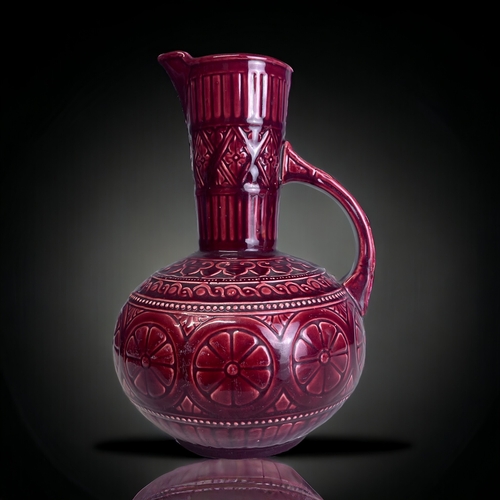 222 - A CHRISTOPHER DRESSER FOR SAMUEL LEAR JUG.
Circa 1880. Aesthetic design.
Height - 24cm