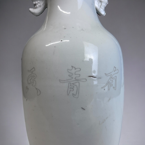 180 - A CHINESE WHITE PORCELAIN BALUSTER VASE. 
Late Qing / Republic period.
Black painted Bamboo outcrop.... 