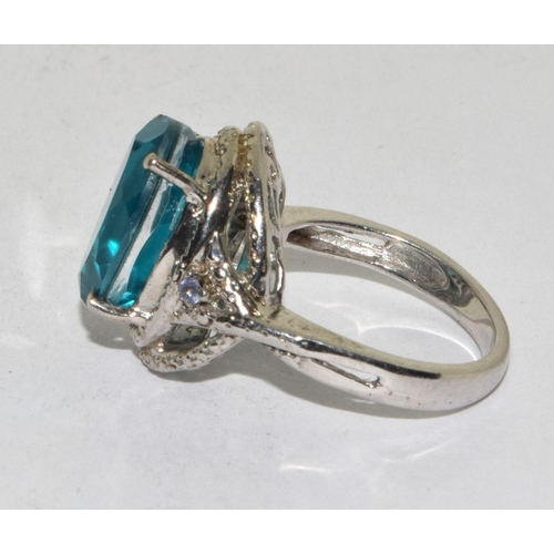 62 - 925 silver Aqua blue statement ring in a Halo design size M