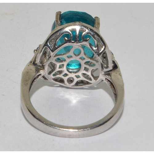 62 - 925 silver Aqua blue statement ring in a Halo design size M