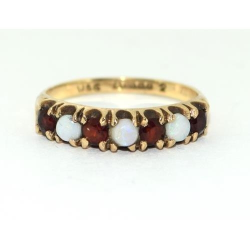 102 - 9ct gold ladies Opal and Garnet half eternity ring set with cabochon opals size N