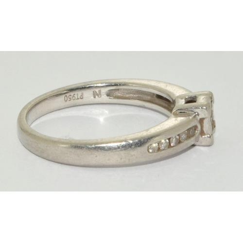 106 - Platinum Ladies Diamond ring set with Diamond shoulders and H/M in ring as 0.25ct size L