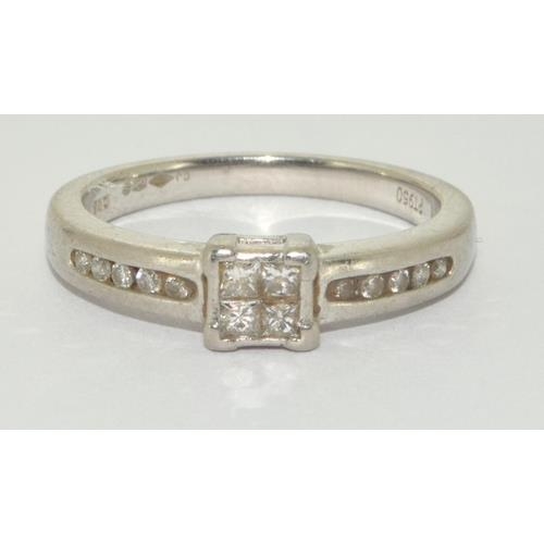 106 - Platinum Ladies Diamond ring set with Diamond shoulders and H/M in ring as 0.25ct size L