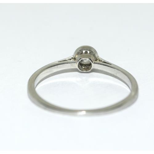 114 - 18ct white gold ladies diamond solitaire ring approx 0.25ct size M