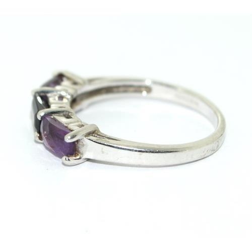 119 - 9ct white gold ladies Amethyst and Sapphire ring size N