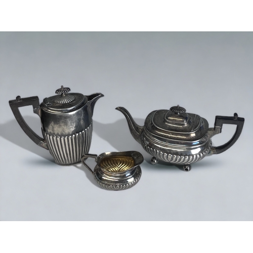 76 - 19TH CENTURY ATKIN BROTHERS SILVER PLATE TEAPOT & MILK JUG.
Together with a similar Britannia metal ... 