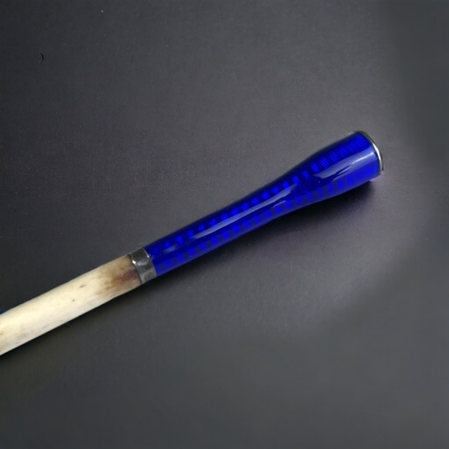 96A - A GUILLOCHE ENAMEL LADIES CHEROOT / CIGARETTE HOLDER. 
With sterling silver collar and bone mouth-pi... 