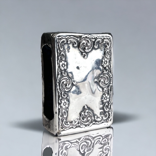 108 - A VICTORIAN STERLING SILVER MATCHBOX HOLDER.
Stylised scrolling foliate design.
London, 1898 hallmar... 