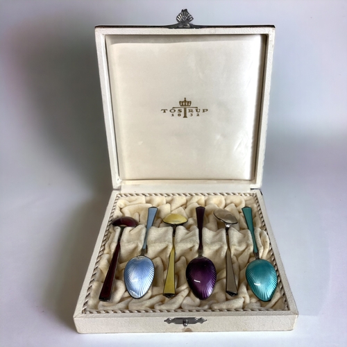 311 - A SET OF FIVE MAGNUS AASE (NORWAY) SILVER ENAMEL SPOONS.
Married with a Tostrup box and one Tostrup ... 