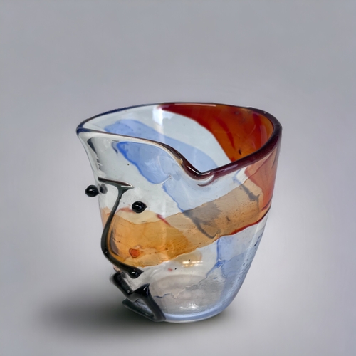 144 - A MURANO GLASS GLASS ABSTRACT 'FACE' VASE.
By Mario Badioli, Circa 1970.
Height - 11cm