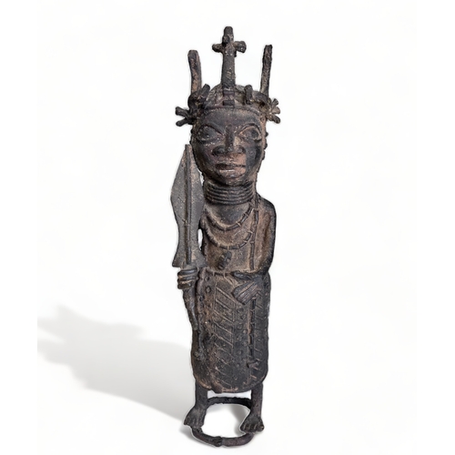 239 - A BENIN BRONZE OBA 'WARRIOR' FIGURE.
Nigeria, 20th century.
Height - 40cm