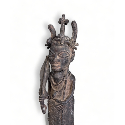 239 - A BENIN BRONZE OBA 'WARRIOR' FIGURE.
Nigeria, 20th century.
Height - 40cm