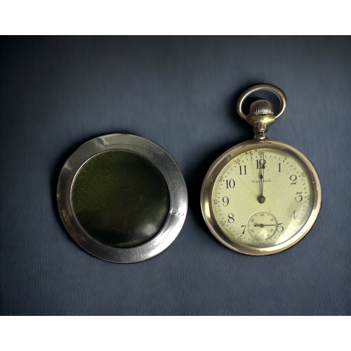 120 - A GOLD FILLED WALTHAM MENS POCKET WATCH.
Circa 1908, 15 Jewels. 
Together with a German watch protec... 