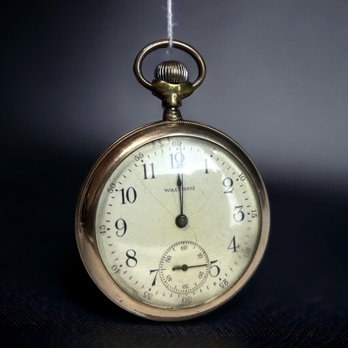 120 - A GOLD FILLED WALTHAM MENS POCKET WATCH.
Circa 1908, 15 Jewels. 
Together with a German watch protec... 