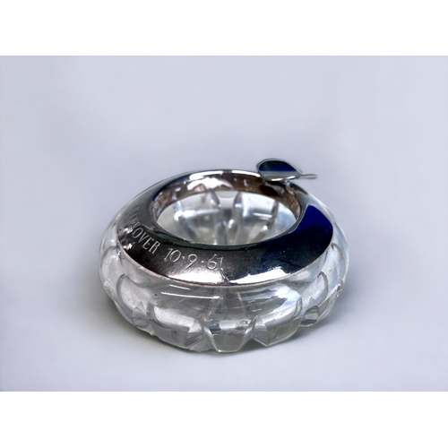 98 - A STERLING SILVER & CUT GLASS ASHTRAY.
Together with a collection of silver plate condiments, Pheasa... 