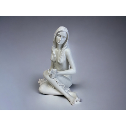 68 - AN ART DECO STYLE WHITE RESIN SEMI NUDE SCULPTURE. 
Unmarked.
Height - 27cm