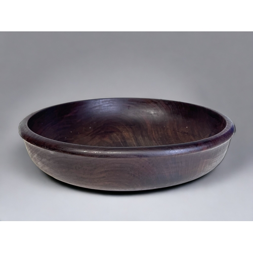 147 - A SIGNED TURNED SOMERSET WALNUT CENTREPIECE BOWL.
Together with another similar. 
Largest - 7.5 x 30... 