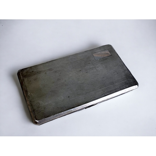 110 - A STERLING SILVER CIGARETTE CASE. 
Engine turned design, with Gilt interior. 
Birmingham, 1946 hallm... 