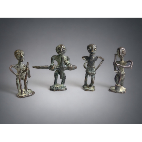 237 - Four Akan bronze gold weights. 
Ashanti people, Ghana.
height- 5cm